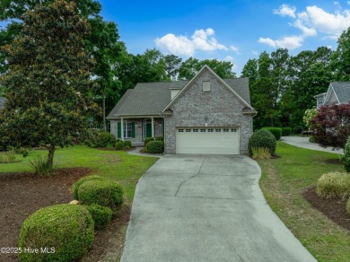Nestled in a quiet cul-de-sac and backed by a serene pond shaded on Members Club At St. James Plantation in North Carolina - for sale on GolfHomes.com, golf home, golf lot