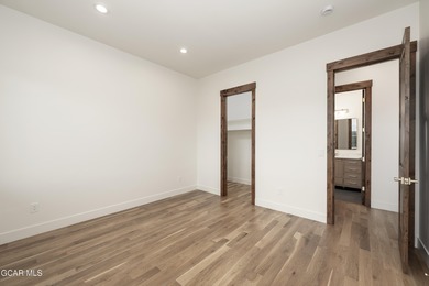 This Mountain Chic home is all about the views ! With windows on Headwaters Golf Course At Granby Ranch in Colorado - for sale on GolfHomes.com, golf home, golf lot