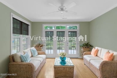 Nestled in a quiet cul-de-sac and backed by a serene pond shaded on Members Club At St. James Plantation in North Carolina - for sale on GolfHomes.com, golf home, golf lot