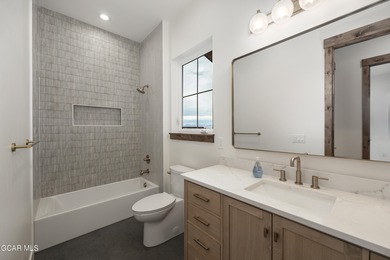 This Mountain Chic home is all about the views ! With windows on Headwaters Golf Course At Granby Ranch in Colorado - for sale on GolfHomes.com, golf home, golf lot