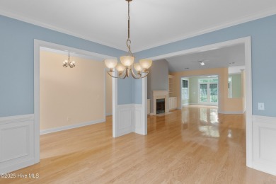 Nestled in a quiet cul-de-sac and backed by a serene pond shaded on Members Club At St. James Plantation in North Carolina - for sale on GolfHomes.com, golf home, golf lot