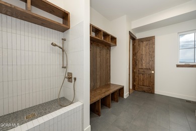 This Mountain Chic home is all about the views ! With windows on Headwaters Golf Course At Granby Ranch in Colorado - for sale on GolfHomes.com, golf home, golf lot