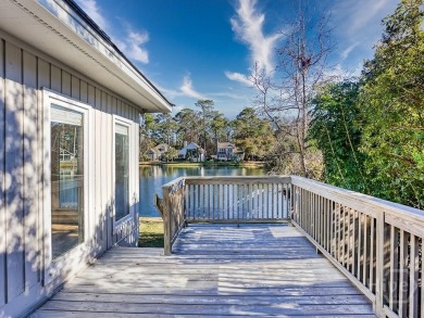 Panoramic lagoon views for waterfront Landings home only a half on The Landings Club - Oakridge in Georgia - for sale on GolfHomes.com, golf home, golf lot