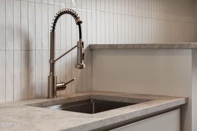 This Mountain Chic home is all about the views ! With windows on Headwaters Golf Course At Granby Ranch in Colorado - for sale on GolfHomes.com, golf home, golf lot