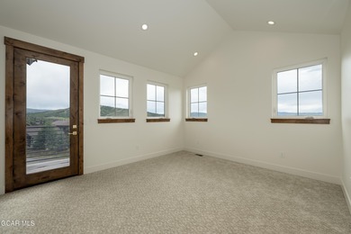 This Mountain Chic home is all about the views ! With windows on Headwaters Golf Course At Granby Ranch in Colorado - for sale on GolfHomes.com, golf home, golf lot