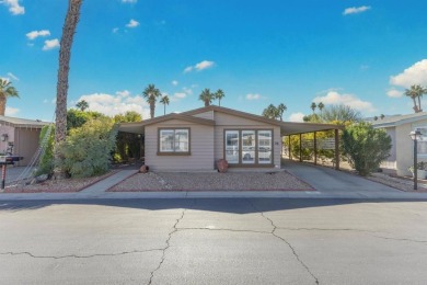 Welcome to this inviting 2-bedroom, 2-bath manufactured home on Cathedral Canyon Golf and Tennis Club in California - for sale on GolfHomes.com, golf home, golf lot