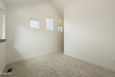 This Mountain Chic home is all about the views ! With windows on Headwaters Golf Course At Granby Ranch in Colorado - for sale on GolfHomes.com, golf home, golf lot