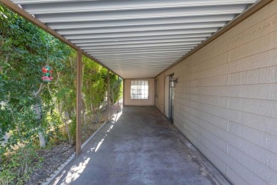 Welcome to this inviting 2-bedroom, 2-bath manufactured home on Cathedral Canyon Golf and Tennis Club in California - for sale on GolfHomes.com, golf home, golf lot