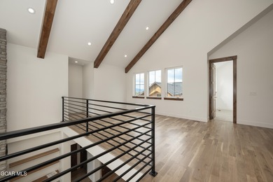 This Mountain Chic home is all about the views ! With windows on Headwaters Golf Course At Granby Ranch in Colorado - for sale on GolfHomes.com, golf home, golf lot