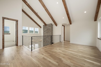 This Mountain Chic home is all about the views ! With windows on Headwaters Golf Course At Granby Ranch in Colorado - for sale on GolfHomes.com, golf home, golf lot