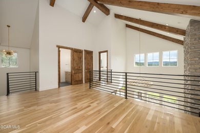 This Mountain Chic home is all about the views ! With windows on Headwaters Golf Course At Granby Ranch in Colorado - for sale on GolfHomes.com, golf home, golf lot