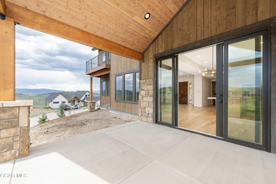 This Mountain Chic home is all about the views ! With windows on Headwaters Golf Course At Granby Ranch in Colorado - for sale on GolfHomes.com, golf home, golf lot