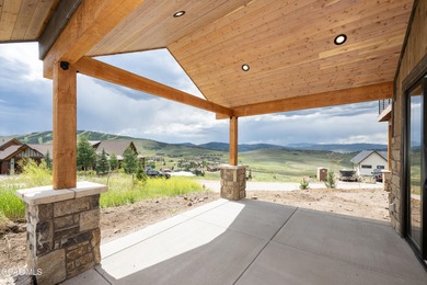 This Mountain Chic home is all about the views ! With windows on Headwaters Golf Course At Granby Ranch in Colorado - for sale on GolfHomes.com, golf home, golf lot