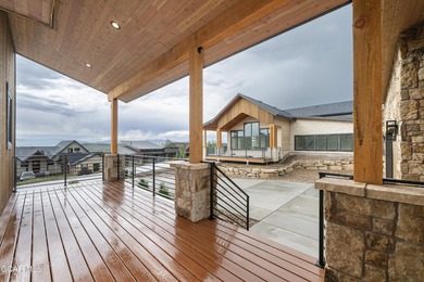 This Mountain Chic home is all about the views ! With windows on Headwaters Golf Course At Granby Ranch in Colorado - for sale on GolfHomes.com, golf home, golf lot