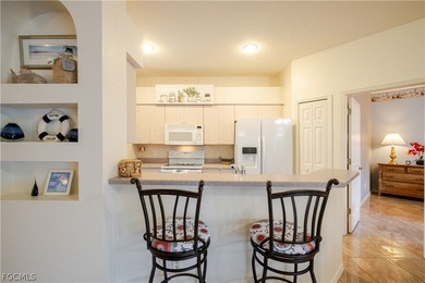 Nestled in a corner lot in Herons Glen this TURNKEY Ibis II home on Herons Glen Golf and Country Club in Florida - for sale on GolfHomes.com, golf home, golf lot