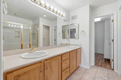 This charming end-unit townhome is nestled in the highly on Indian Peaks Golf Course in Colorado - for sale on GolfHomes.com, golf home, golf lot
