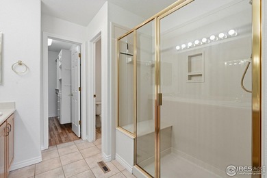 This charming end-unit townhome is nestled in the highly on Indian Peaks Golf Course in Colorado - for sale on GolfHomes.com, golf home, golf lot