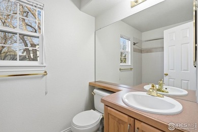 This charming end-unit townhome is nestled in the highly on Indian Peaks Golf Course in Colorado - for sale on GolfHomes.com, golf home, golf lot