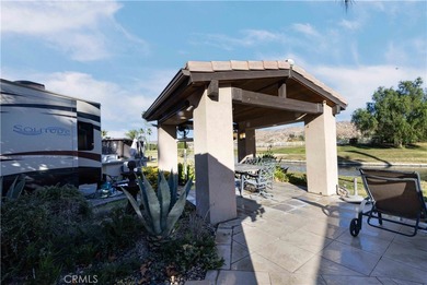 Check out the gated entry to this incredible waterfront on Rancho California RV Resort in California - for sale on GolfHomes.com, golf home, golf lot