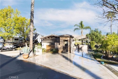 Check out the gated entry to this incredible waterfront on Rancho California RV Resort in California - for sale on GolfHomes.com, golf home, golf lot