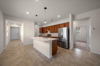 WELCOME to this 3 bedroom, 2 bathrooms, and 2 garage HALLMARK on Stone Creek Golf Club in Florida - for sale on GolfHomes.com, golf home, golf lot