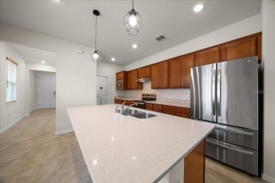 WELCOME to this 3 bedroom, 2 bathrooms, and 2 garage HALLMARK on Stone Creek Golf Club in Florida - for sale on GolfHomes.com, golf home, golf lot