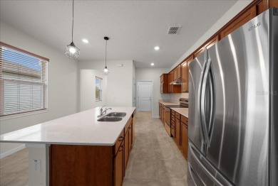 WELCOME to this 3 bedroom, 2 bathrooms, and 2 garage HALLMARK on Stone Creek Golf Club in Florida - for sale on GolfHomes.com, golf home, golf lot