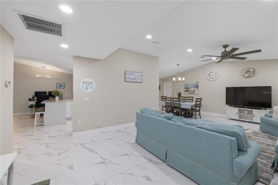 Welcome to this beautifully updated 4-bedroom, 2-bathroom pool on Deep Creek Golf Club in Florida - for sale on GolfHomes.com, golf home, golf lot