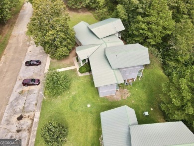 This Income-Producing Quadplex in Alpine, AL is a fantastic on Alpine Bay Resort in Alabama - for sale on GolfHomes.com, golf home, golf lot