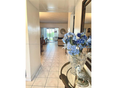 Beautiful 2-bedroom, 2-bathroom CORNER AND FIRST FLOOR condo in on Oriole Golf and Tennis Club in Florida - for sale on GolfHomes.com, golf home, golf lot