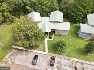 This Income-Producing Quadplex in Alpine, AL is a fantastic on Alpine Bay Resort in Alabama - for sale on GolfHomes.com, golf home, golf lot