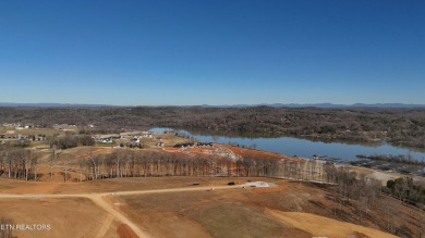 Nestled on a scenic ridge within an exclusive golf community on Tennessee National Golf Club in Tennessee - for sale on GolfHomes.com, golf home, golf lot