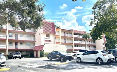 Beautiful 2-bedroom, 2-bathroom CORNER AND FIRST FLOOR condo in on Oriole Golf and Tennis Club in Florida - for sale on GolfHomes.com, golf home, golf lot