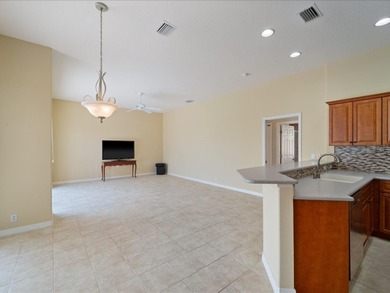 Presenting an exceptional, one-owner residence that has been on Pelican Pointe Golf and Country Club in Florida - for sale on GolfHomes.com, golf home, golf lot