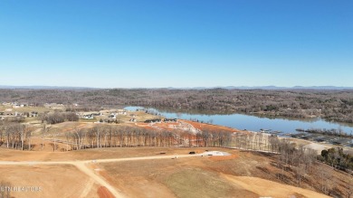 Nestled on a scenic ridge within an exclusive golf community on Tennessee National Golf Club in Tennessee - for sale on GolfHomes.com, golf home, golf lot