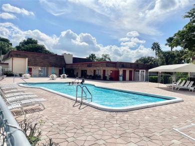 Beautiful 2-bedroom, 2-bathroom CORNER AND FIRST FLOOR condo in on Oriole Golf and Tennis Club in Florida - for sale on GolfHomes.com, golf home, golf lot