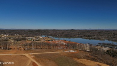 Nestled on a scenic ridge within an exclusive golf community on Tennessee National Golf Club in Tennessee - for sale on GolfHomes.com, golf home, golf lot