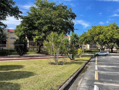 Beautiful 2-bedroom, 2-bathroom CORNER AND FIRST FLOOR condo in on Oriole Golf and Tennis Club in Florida - for sale on GolfHomes.com, golf home, golf lot