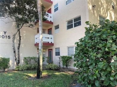 Beautiful 2-bedroom, 2-bathroom CORNER AND FIRST FLOOR condo in on Oriole Golf and Tennis Club in Florida - for sale on GolfHomes.com, golf home, golf lot