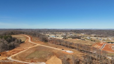 Nestled on a scenic ridge within an exclusive golf community on Tennessee National Golf Club in Tennessee - for sale on GolfHomes.com, golf home, golf lot