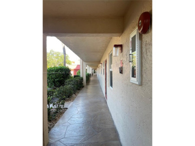 Beautiful 2-bedroom, 2-bathroom CORNER AND FIRST FLOOR condo in on Oriole Golf and Tennis Club in Florida - for sale on GolfHomes.com, golf home, golf lot