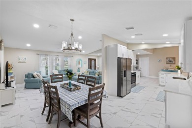 Welcome to this beautifully updated 4-bedroom, 2-bathroom pool on Deep Creek Golf Club in Florida - for sale on GolfHomes.com, golf home, golf lot