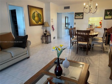 Beautiful 2-bedroom, 2-bathroom CORNER AND FIRST FLOOR condo in on Oriole Golf and Tennis Club in Florida - for sale on GolfHomes.com, golf home, golf lot