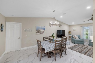 Welcome to this beautifully updated 4-bedroom, 2-bathroom pool on Deep Creek Golf Club in Florida - for sale on GolfHomes.com, golf home, golf lot