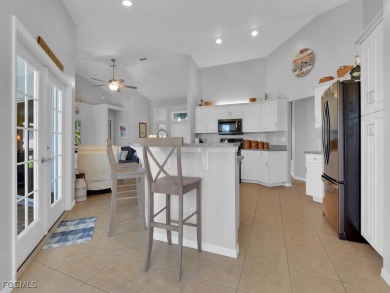 Step into this beautifully maintained 3-bedroom, 2-bath on Coral Oaks Golf Course in Florida - for sale on GolfHomes.com, golf home, golf lot