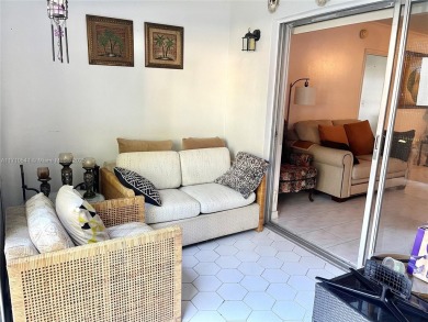 Beautiful 2-bedroom, 2-bathroom CORNER AND FIRST FLOOR condo in on Oriole Golf and Tennis Club in Florida - for sale on GolfHomes.com, golf home, golf lot