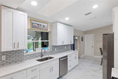 Welcome to this beautifully updated 4-bedroom, 2-bathroom pool on Deep Creek Golf Club in Florida - for sale on GolfHomes.com, golf home, golf lot