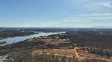 Nestled on a scenic ridge within an exclusive golf community on Tennessee National Golf Club in Tennessee - for sale on GolfHomes.com, golf home, golf lot