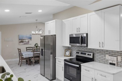 Welcome to this beautifully updated 4-bedroom, 2-bathroom pool on Deep Creek Golf Club in Florida - for sale on GolfHomes.com, golf home, golf lot