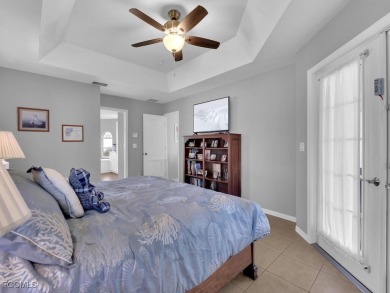 Step into this beautifully maintained 3-bedroom, 2-bath on Coral Oaks Golf Course in Florida - for sale on GolfHomes.com, golf home, golf lot